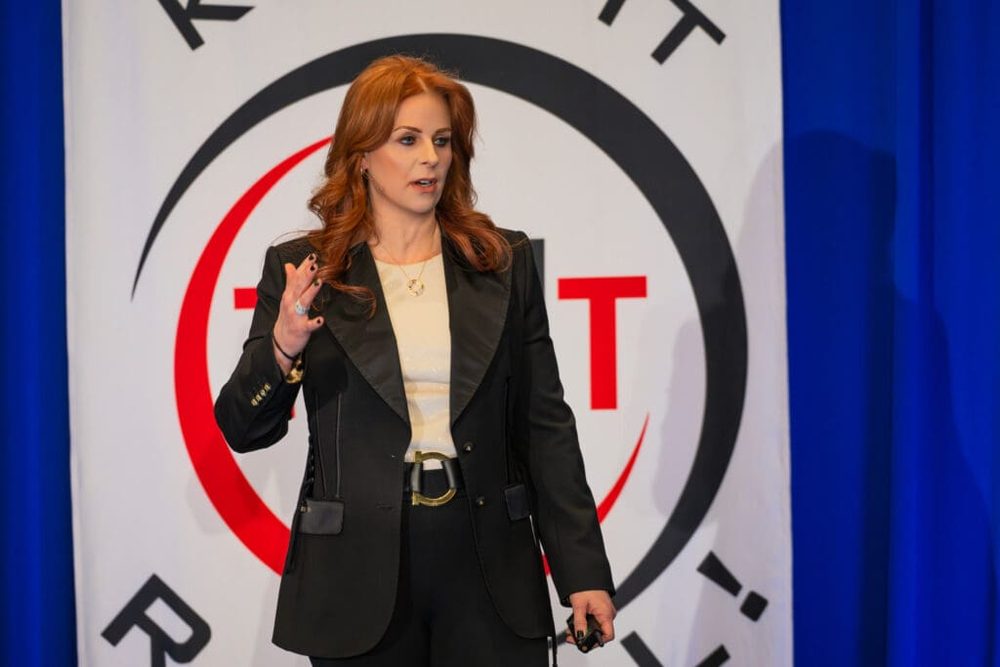 Robin Robins presenting at a TMT event